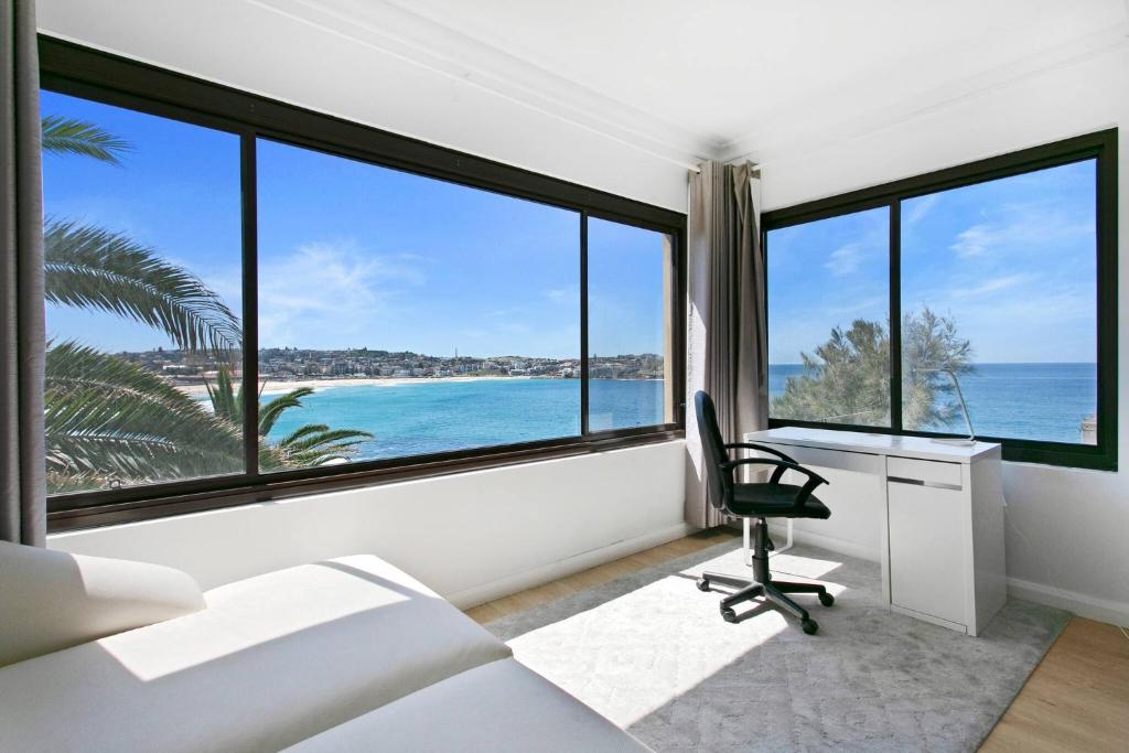 a bedroom with a view of the ocean at Ultimate Bondi Escape #2 Stunning Views ! in Sydney