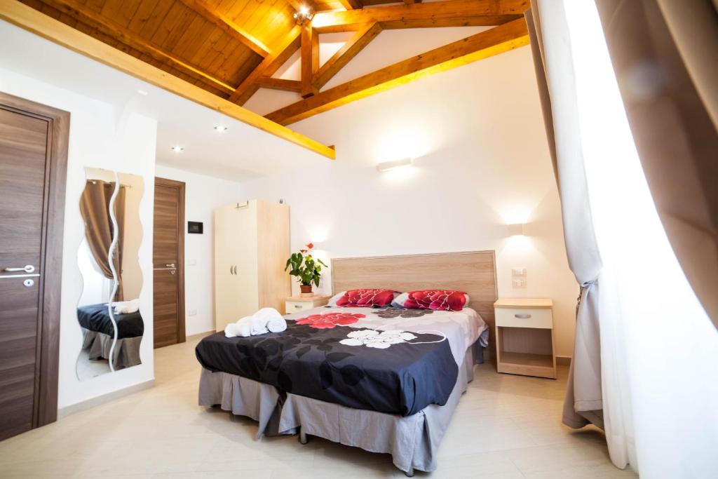 Postel nebo postele na pokoji v ubytování B&B Villa Marsico