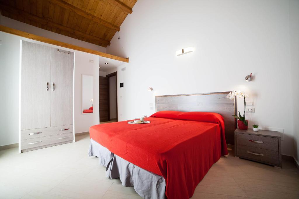 Postel nebo postele na pokoji v ubytování B&B Villa Marsico