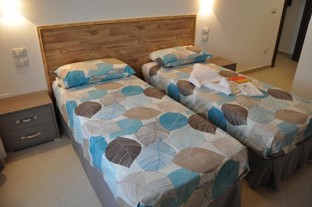 Postel nebo postele na pokoji v ubytování B&B Villa Marsico
