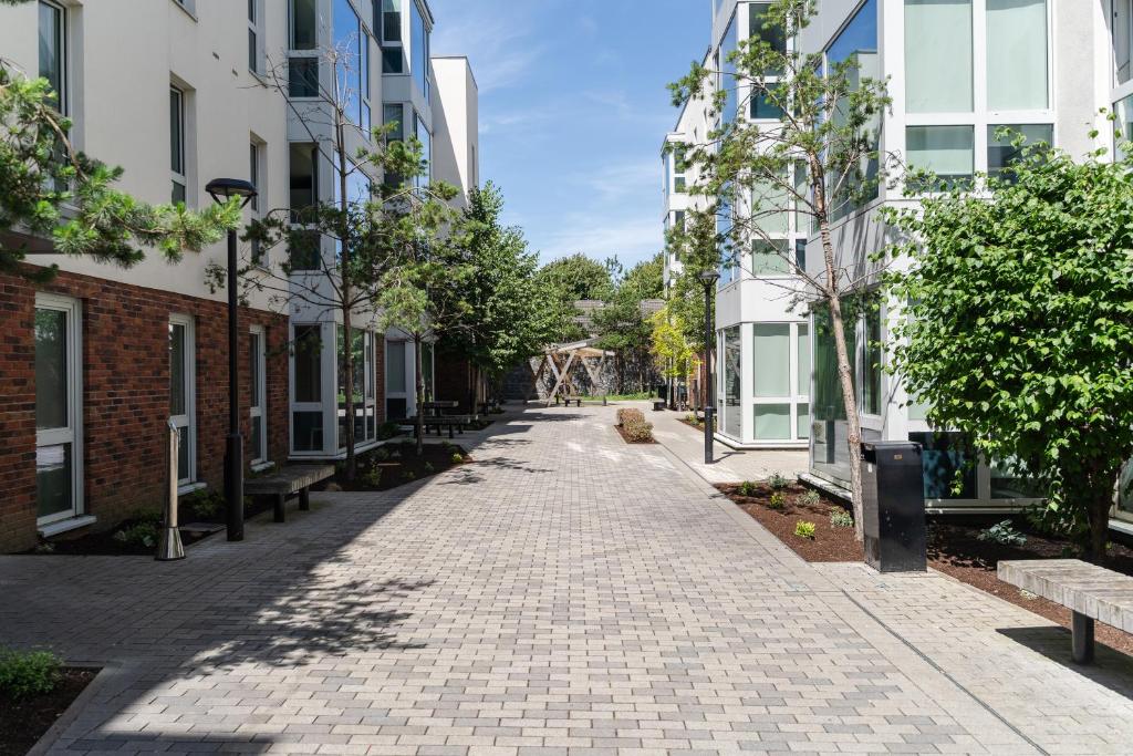 an empty street in a city with buildings at Destiny Student - Parkgate in Dublin