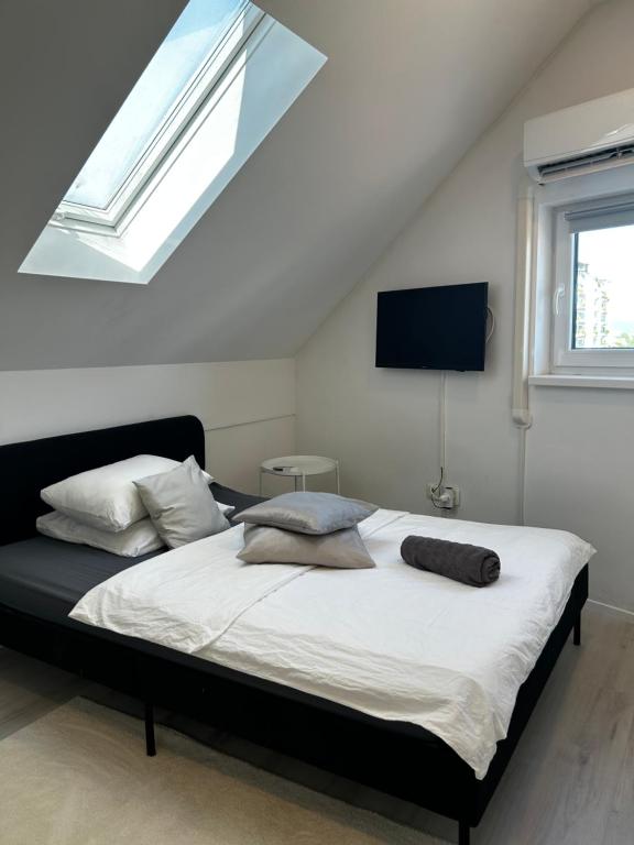 Ένα ή περισσότερα κρεβάτια σε δωμάτιο στο The Getaway Ljubljana