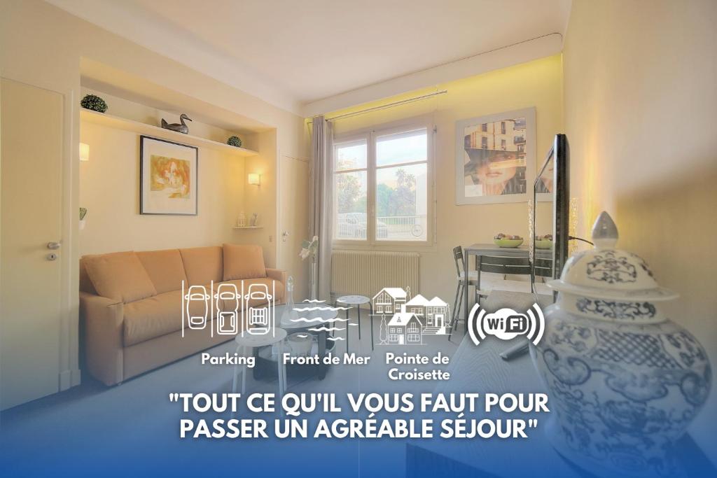 un salon avec un canapé et une table dans l'établissement Le Ed- Croisette - Parking - VCA, à Cannes