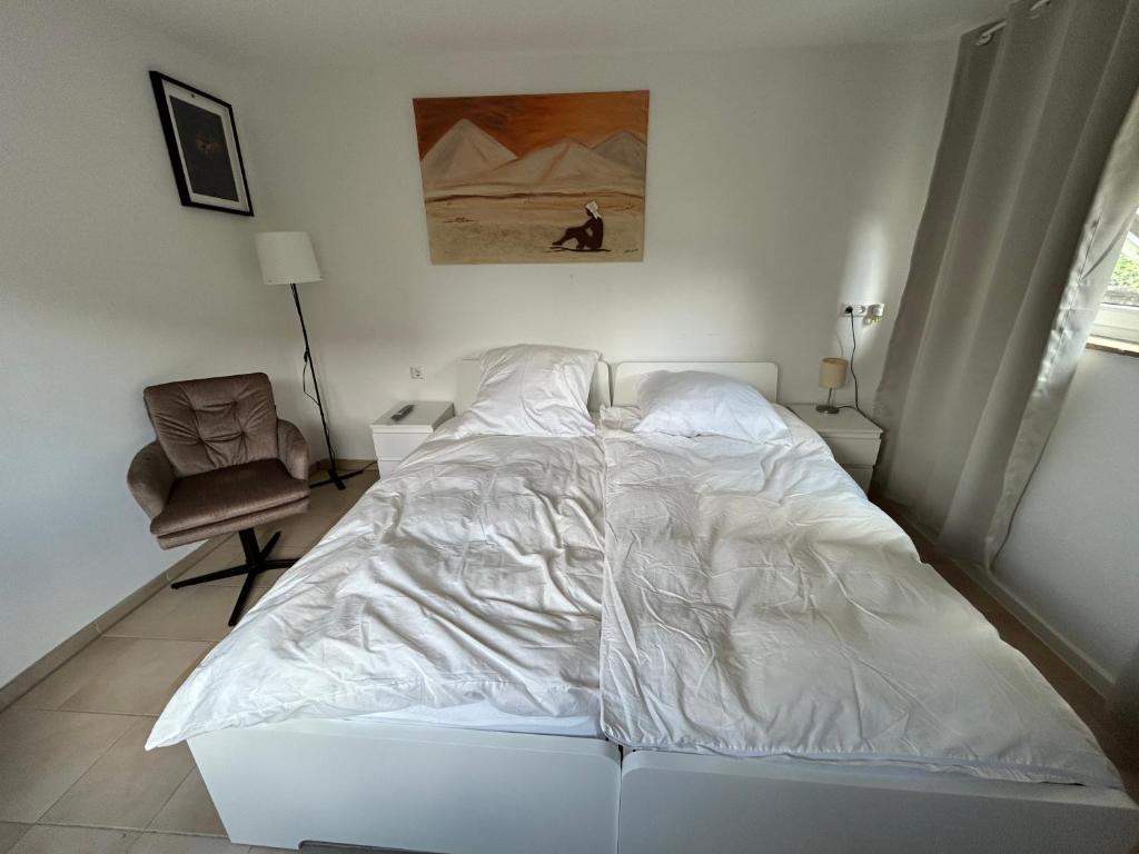 Postel nebo postele na pokoji v ubytování Home Feeling Appartment