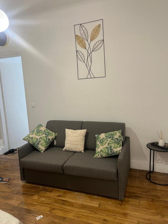 Χώρος καθιστικού στο Appartement Acote de paris ou Disney