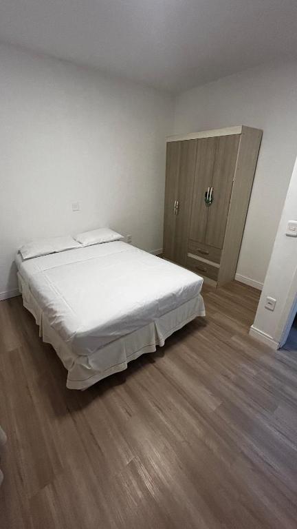 Postel nebo postele na pokoji v ubytování Apartamento à 100 metros do mar - Meia Praia