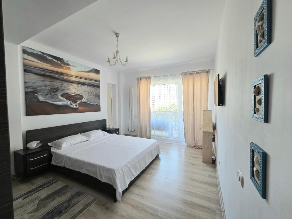 Postel nebo postele na pokoji v ubytování Amira Apartament