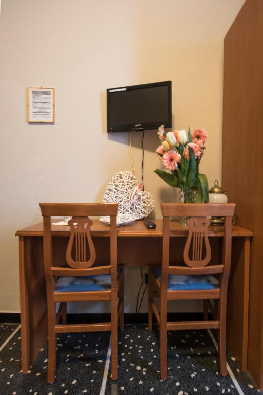 TV a/nebo společenská místnost v ubytování Hotel Bristol