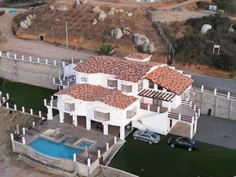 an overhead view of a large white house with a pool at Villa Casa Blanca in Las Palmas