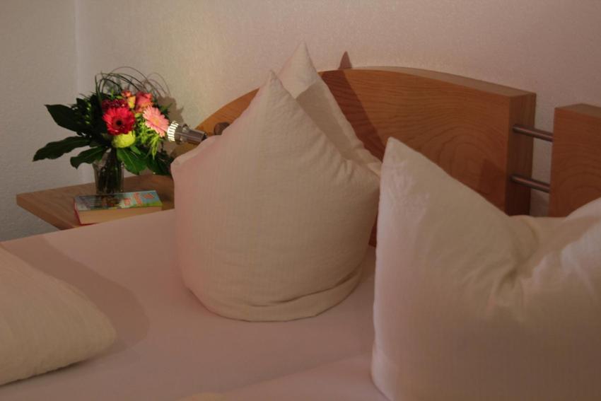Postel nebo postele na pokoji v ubytování dr'Berghof