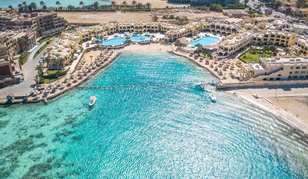 an aerial view of a beach with a resort at Sunny Days Palma De Mirette Resort & Spa in Hurghada