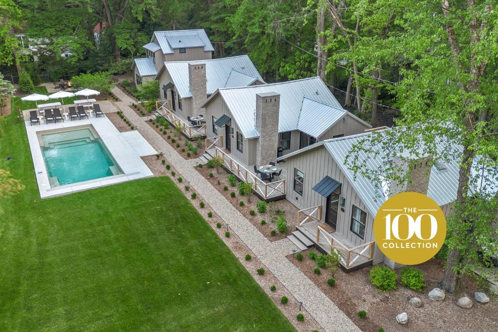 an aerial view of a house with a swimming pool at The Townie Cottages - All Units in Union Pier