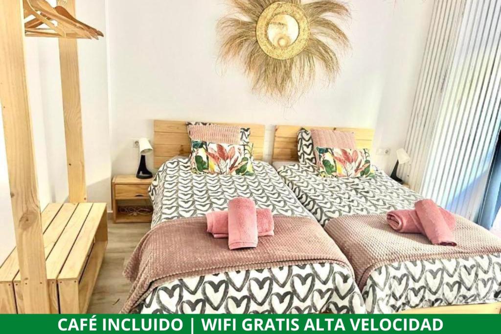 Postel nebo postele na pokoji v ubytování Alzira bonita Loft A junto plaza mayor, la Murta