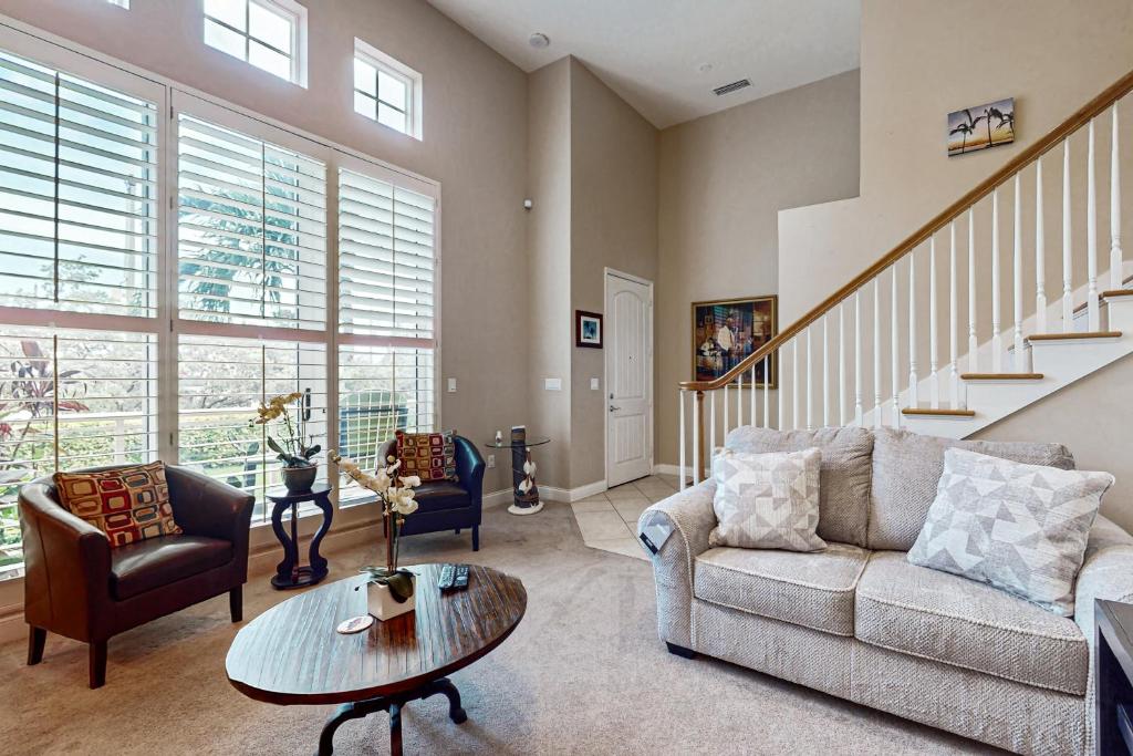 a living room with a couch and a table at Belle Harbor 13 in Clearwater Beach
