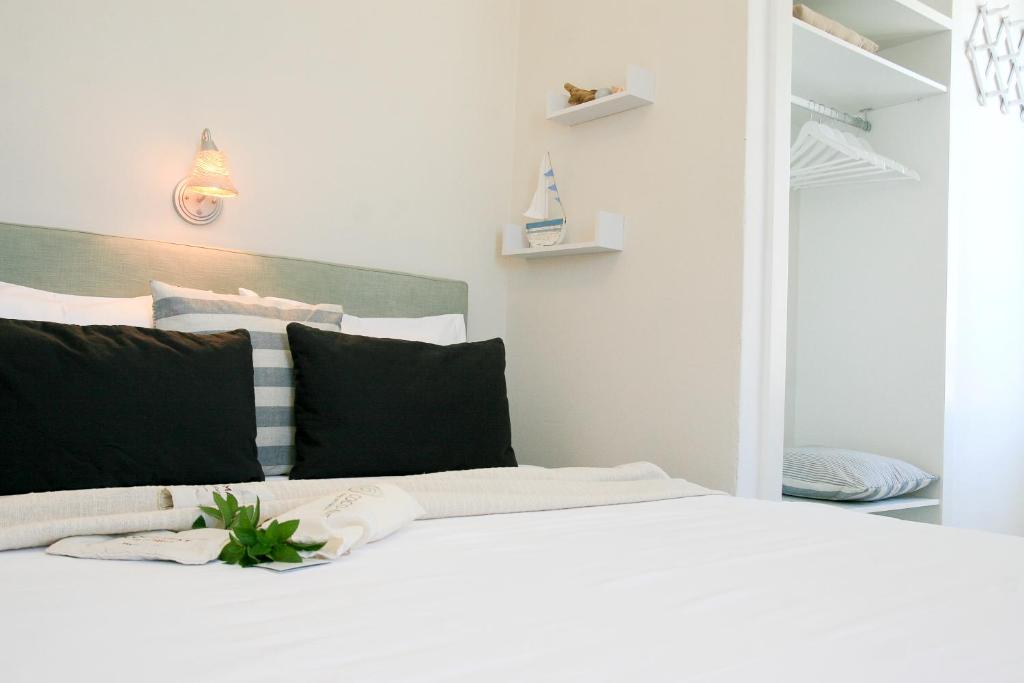 Postel nebo postele na pokoji v ubytování Paradissos Hotel