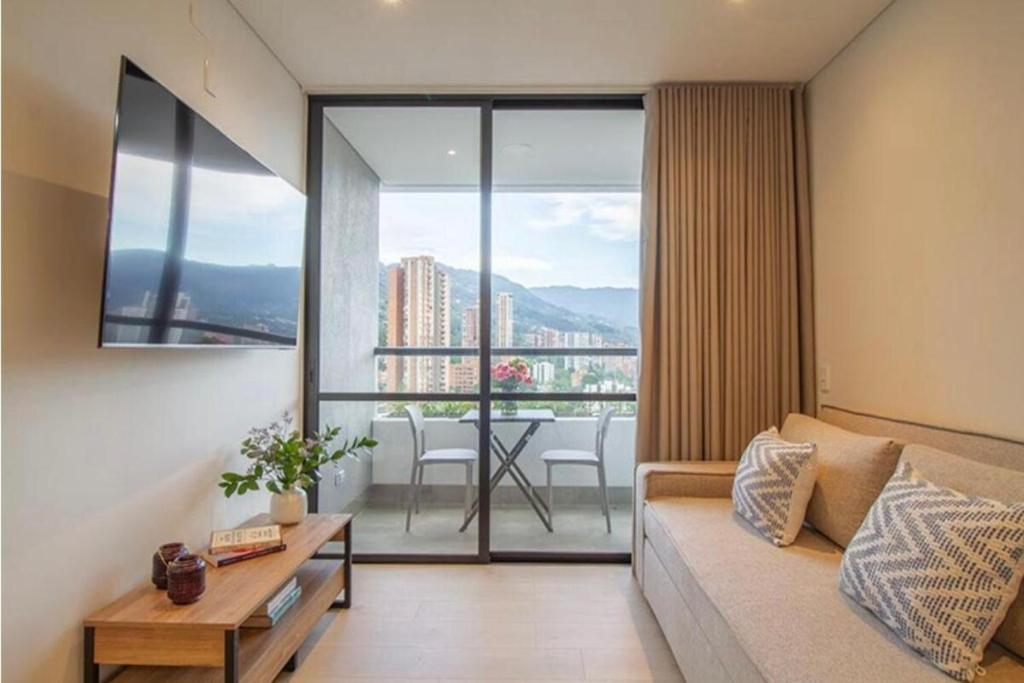 Μια τηλεόραση ή/και κέντρο ψυχαγωγίας στο Beautiful apartment in Poblado
