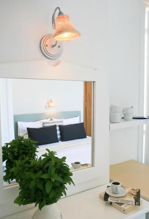 Postel nebo postele na pokoji v ubytování Paradissos Hotel