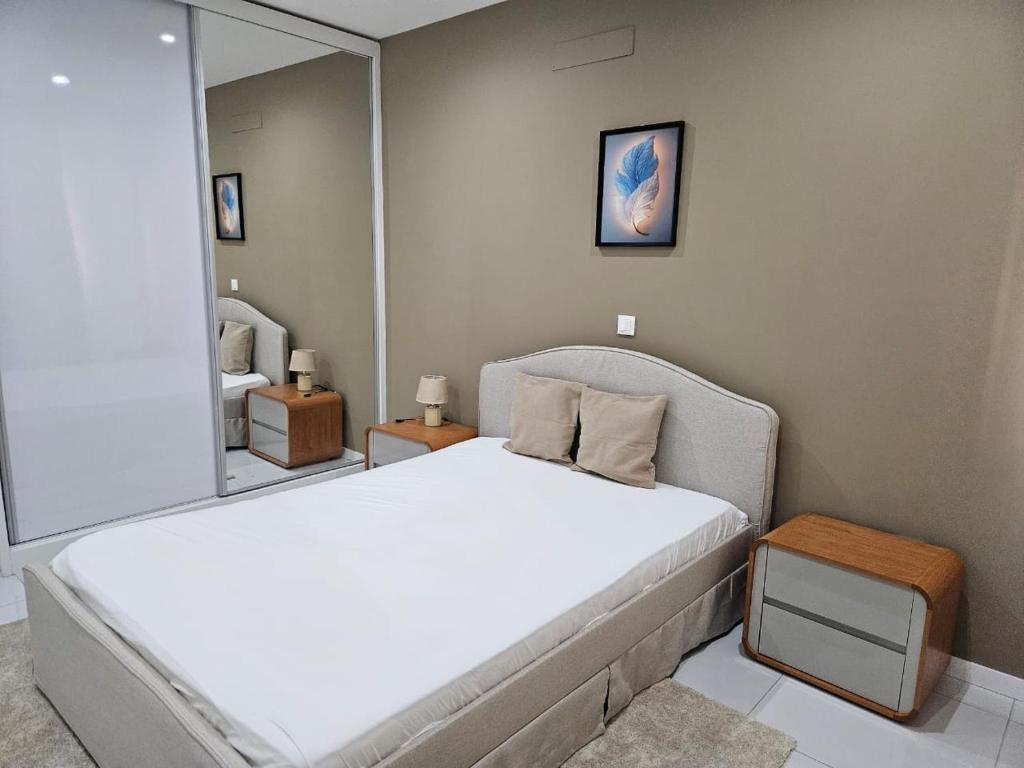 Una cama o camas en una habitación de T3 Duplex - Palmarejo Grande