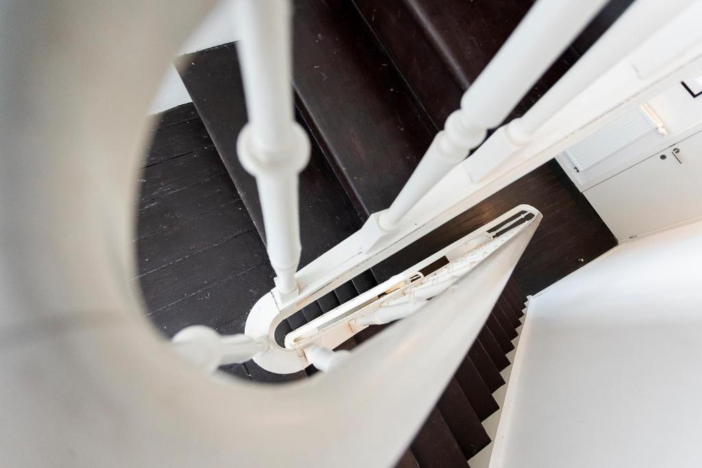 a ceiling view of a staircase in a building at Point du jour in Ostend