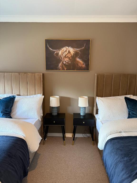 Ένα ή περισσότερα κρεβάτια σε δωμάτιο στο Waterside House