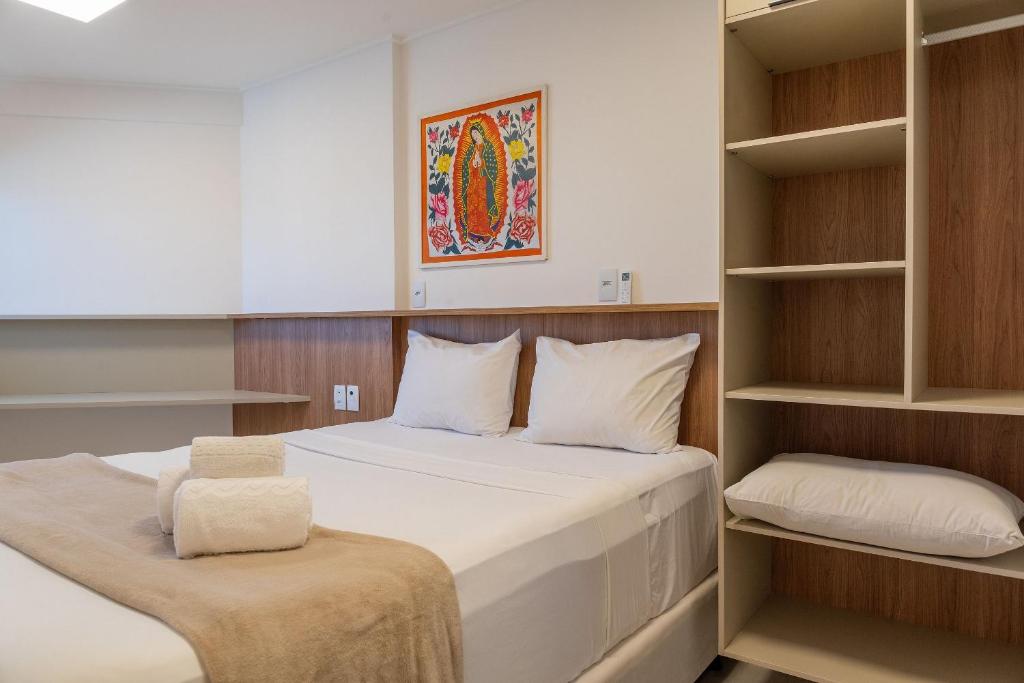 Ένα ή περισσότερα κρεβάτια σε δωμάτιο στο Studio Design 3 Apt 807 -Mandi Hospitalidade