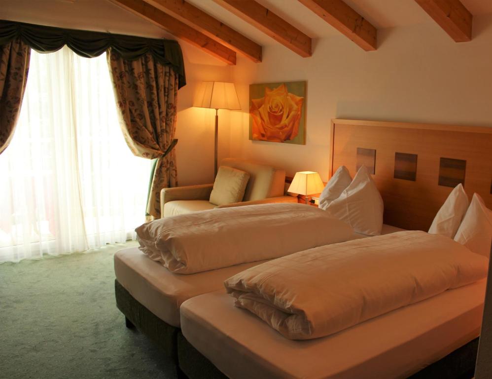 Voodi või voodid majutusasutuse Hotel Rotwand toas