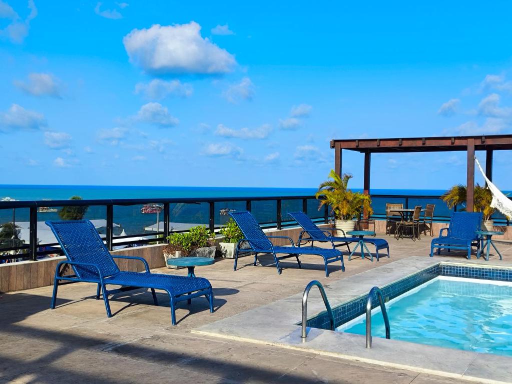 Swimmingpoolen hos eller tæt på Flat Luxo Frente Mar com Vista Espetacular