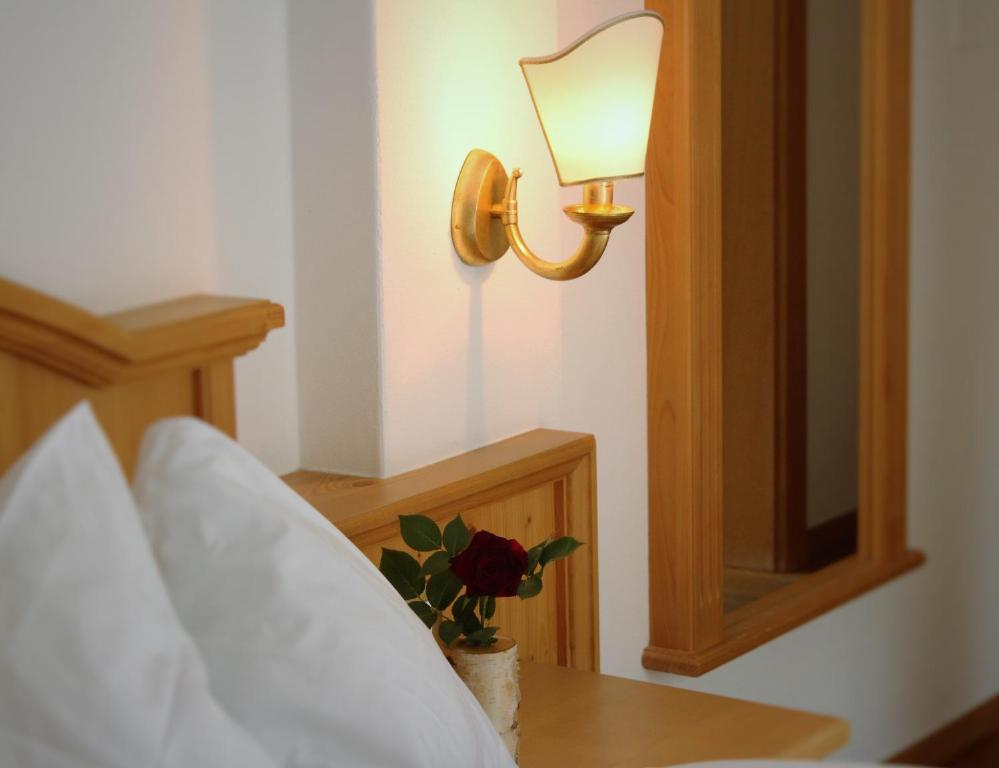 Voodi või voodid majutusasutuse Hotel Rotwand toas