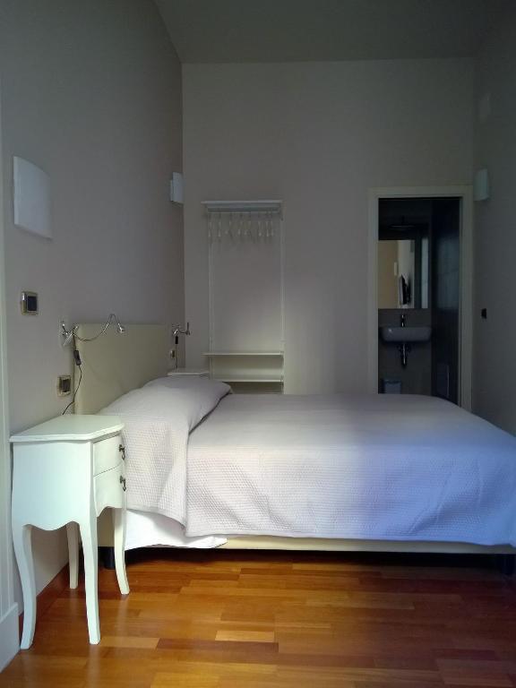 Postel nebo postele na pokoji v ubytování B&B Casa D'alleri