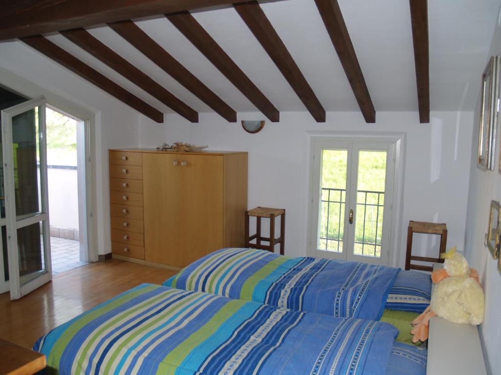 Łóżko lub łóżka w pokoju w obiekcie B&B Smile