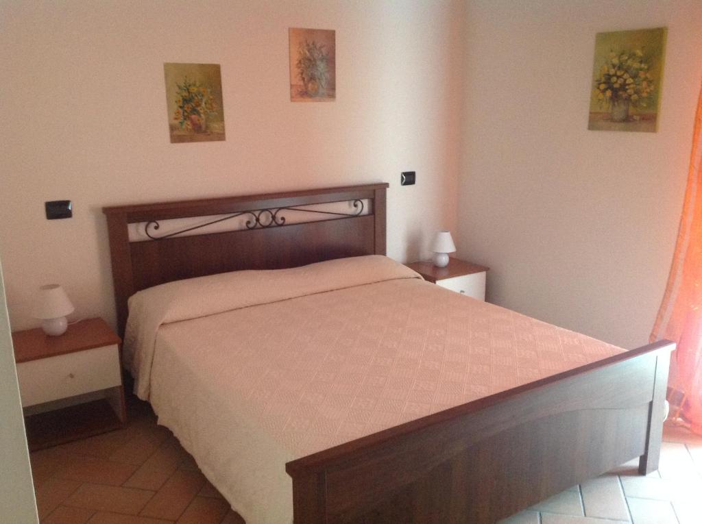 Łóżko lub łóżka w pokoju w obiekcie B&B Smile