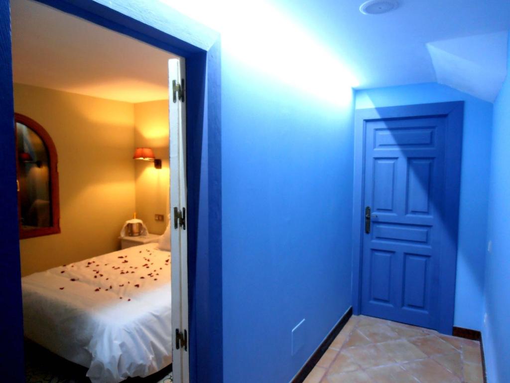 Cama o camas de una habitación en Hotel Rural La Viña - Only Adults