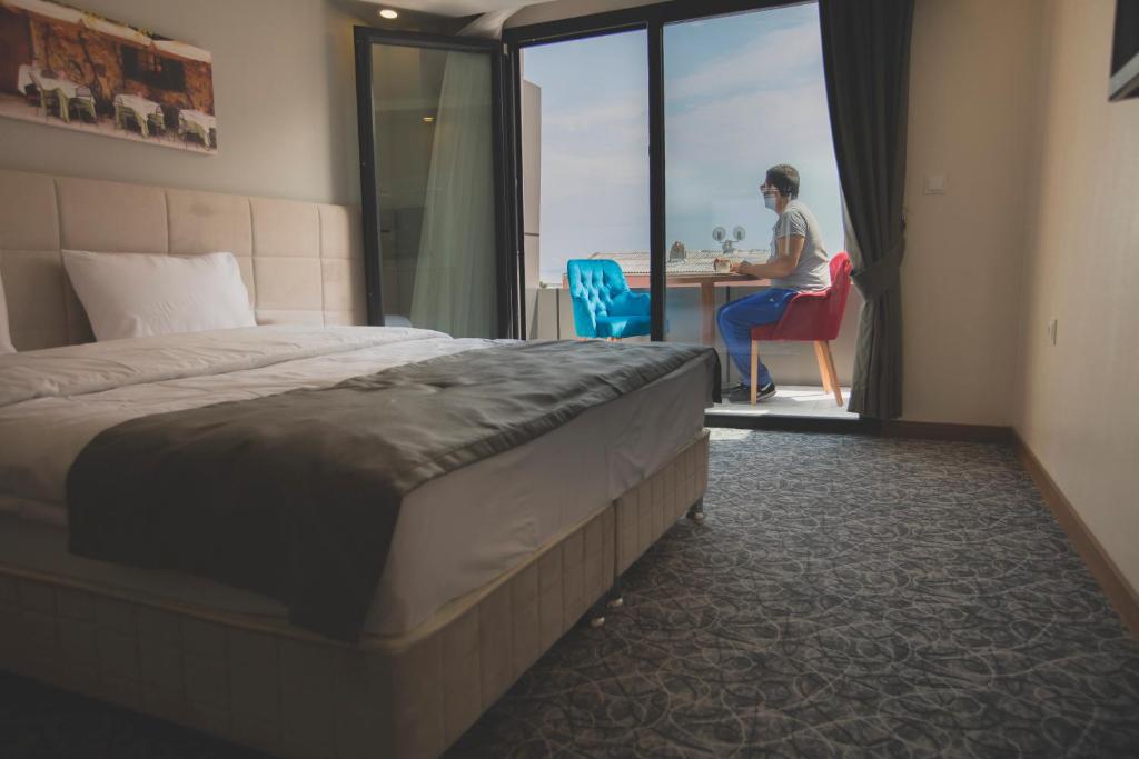 Postel nebo postele na pokoji v ubytování Royal İnci Hotel