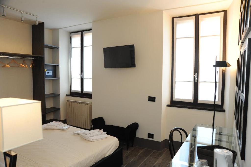 Postel nebo postele na pokoji v ubytování La Mainolda B&B