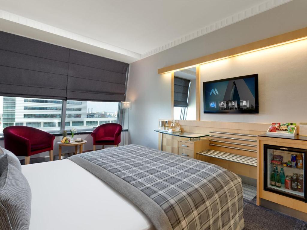 Postel nebo postele na pokoji v ubytování Metropolitan Hotels Ankara