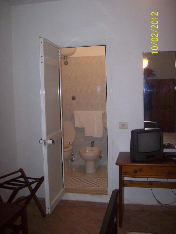 Koupelna v ubytování Albergo La Perla