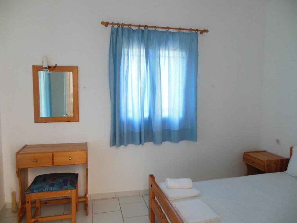 Postel nebo postele na pokoji v ubytování Helonata Apartments