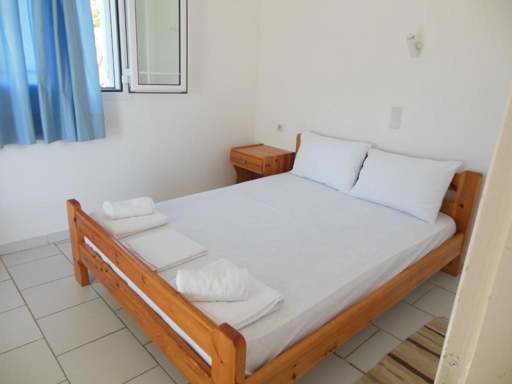 Postel nebo postele na pokoji v ubytování Helonata Apartments