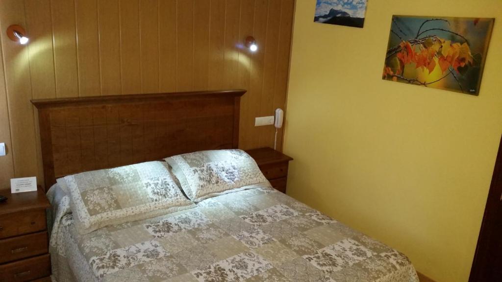 Postel nebo postele na pokoji v ubytování Hotel Sarao