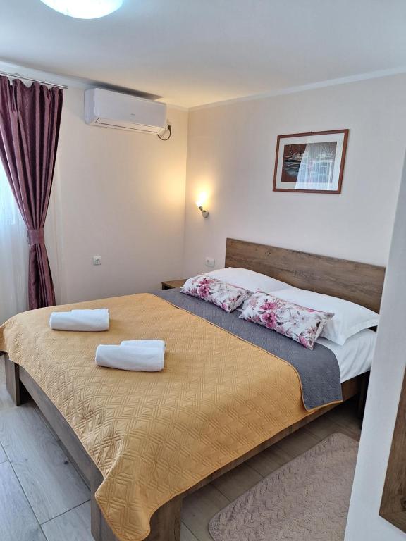 Posteľ alebo postele v izbe v ubytovaní Apartments Kozjan