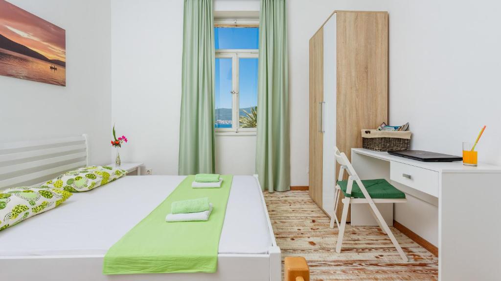 Postel nebo postele na pokoji v ubytování Riva Guesthouse