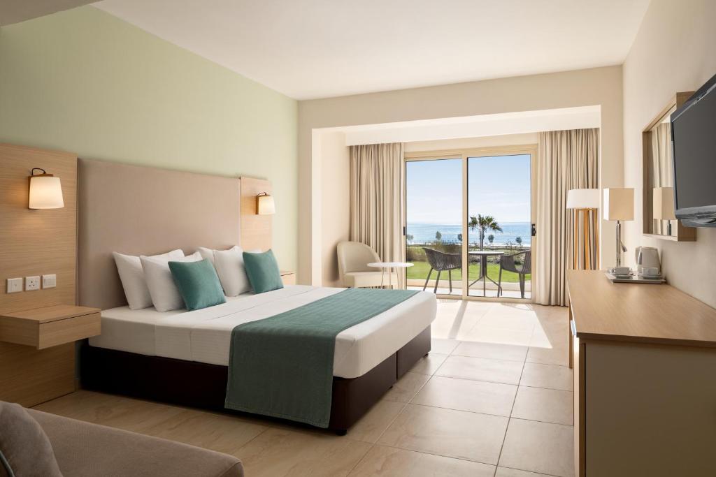 Katil atau katil-katil dalam bilik di Freij Hotel & Resort