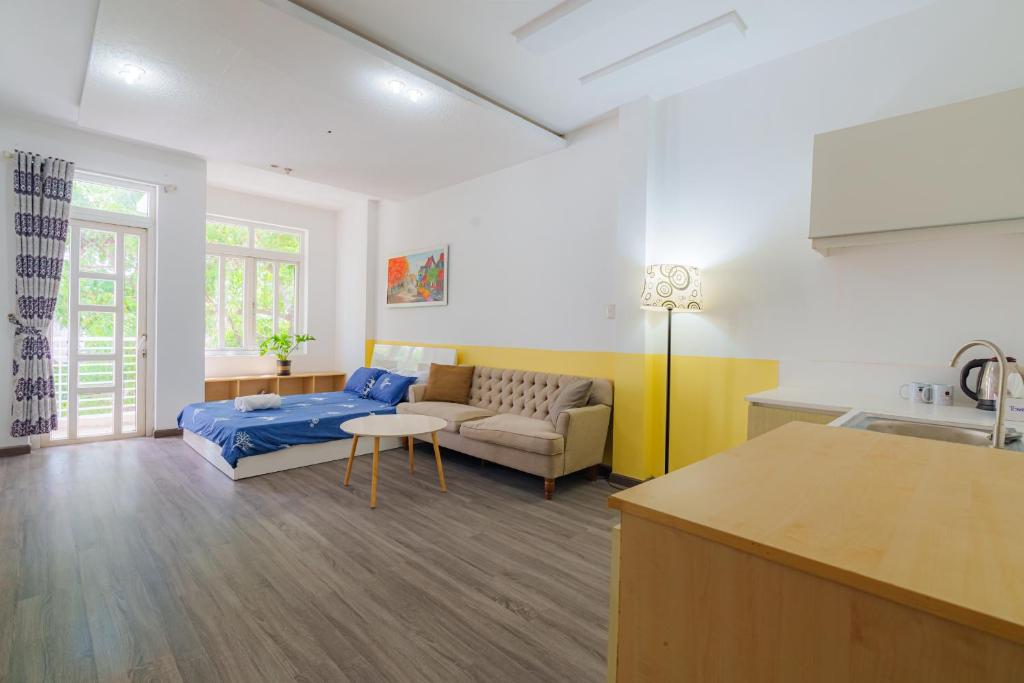 Posezení v ubytování NewRoom-1km 2 Bui Vien-Max3People