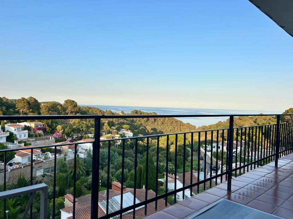 a balcony with a view of the ocean at Cala Morisca full AC Sea View Home in Tossa de Mar