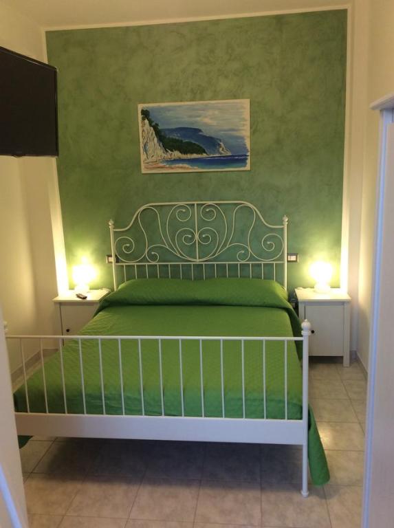 Postel nebo postele na pokoji v ubytování Bed and Breakfast Sara Mare