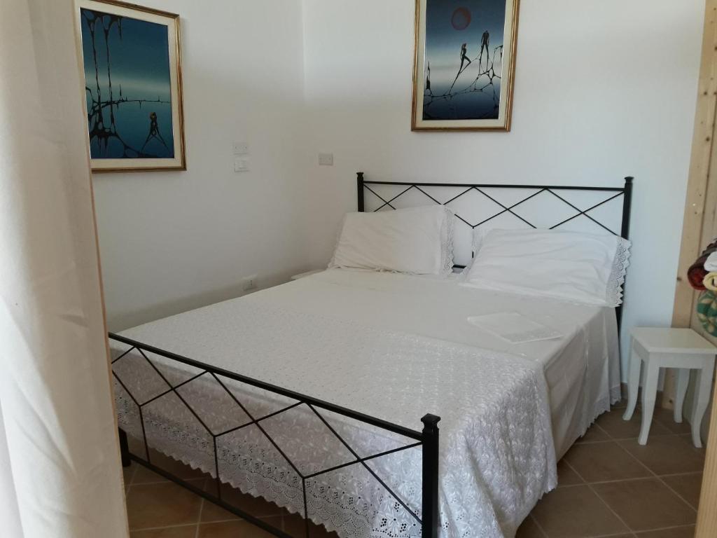 Łóżko lub łóżka w pokoju w obiekcie Agriturismo La Stradaccia