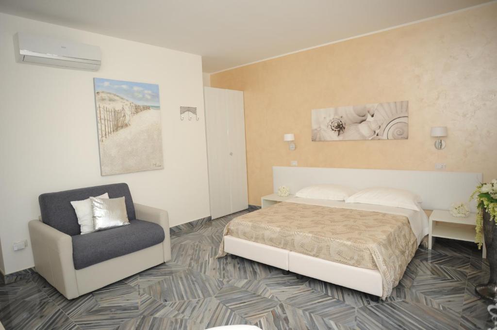 A bed or beds in a room at Casa Alfieri"rooms and Apartments"