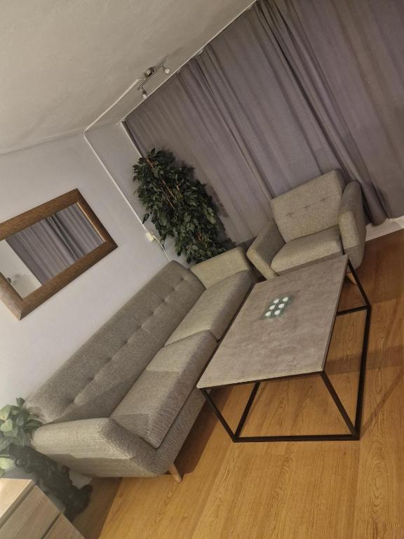 Posezení v ubytování Studio Apartment Central
