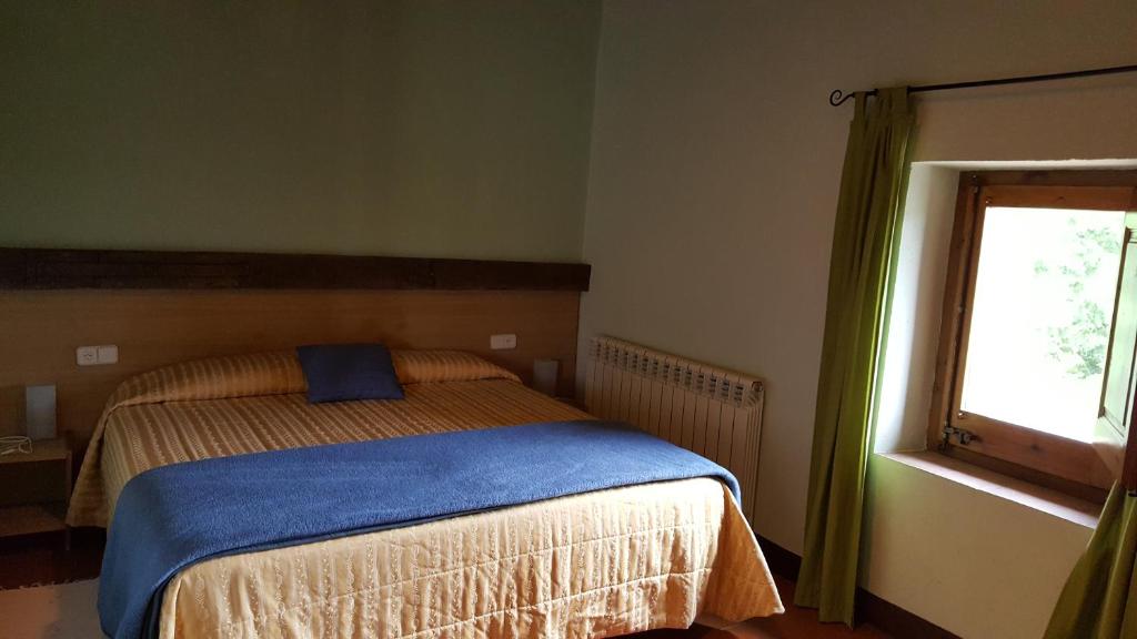 Postel nebo postele na pokoji v ubytování Mas Rubió