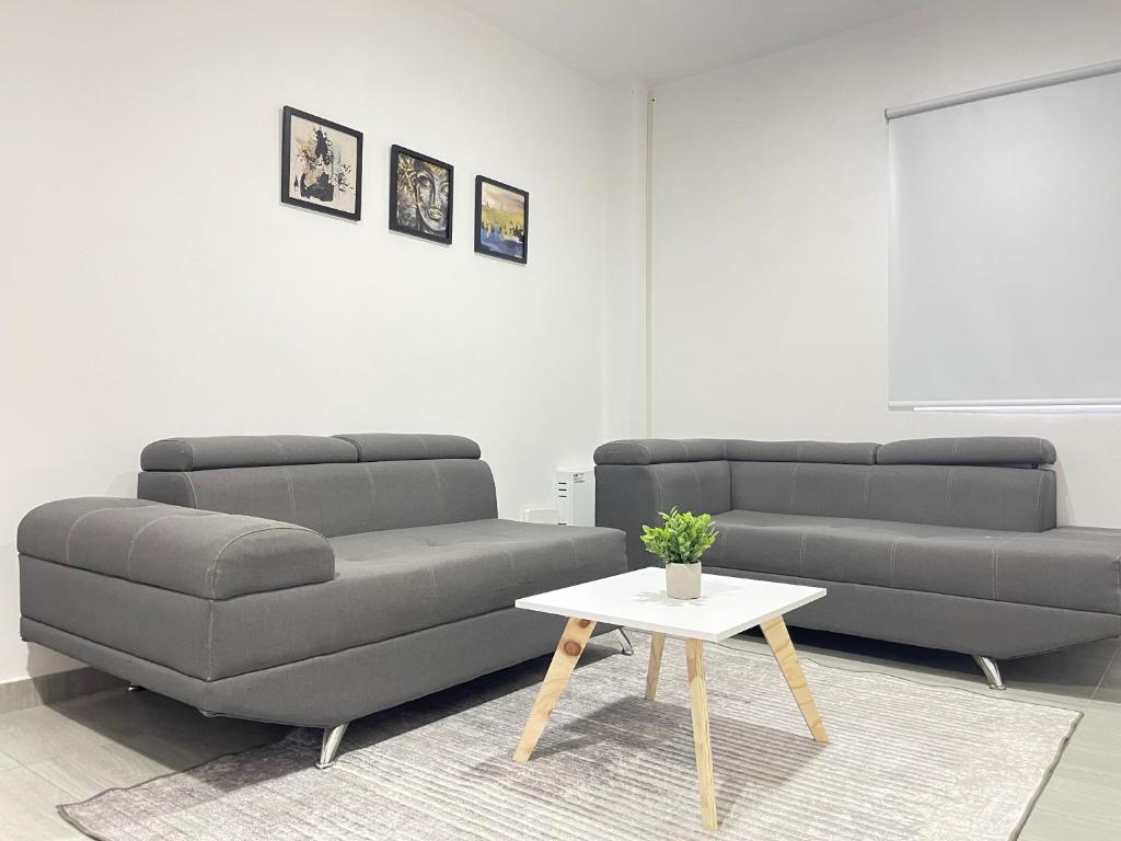 Ruang duduk di Casa de dos pisos con aire